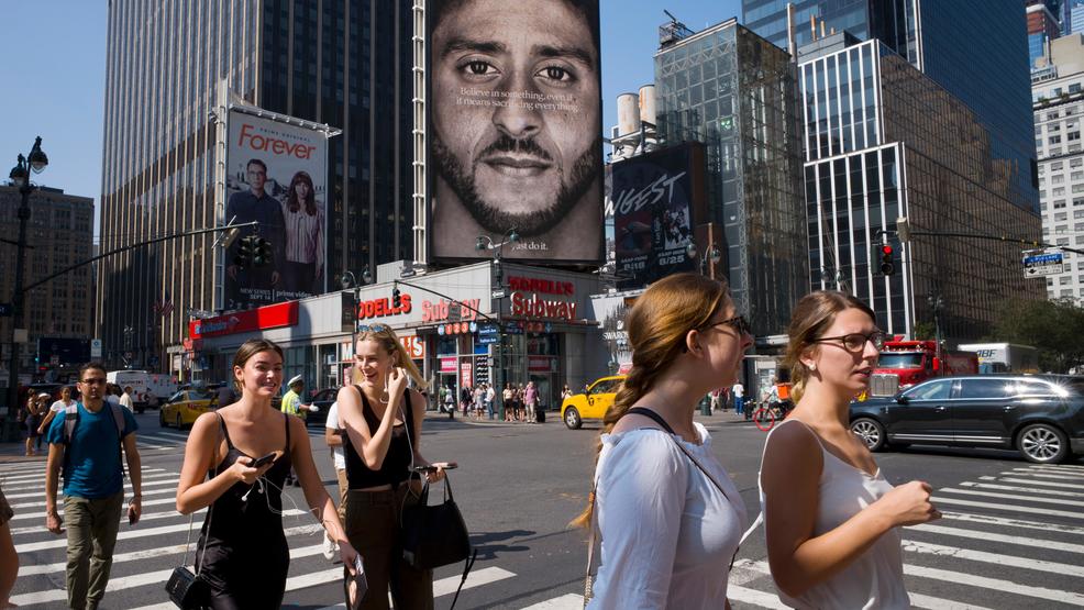 APTOPIX Trump Nike Kaepernick bill board ad AP693.jpg