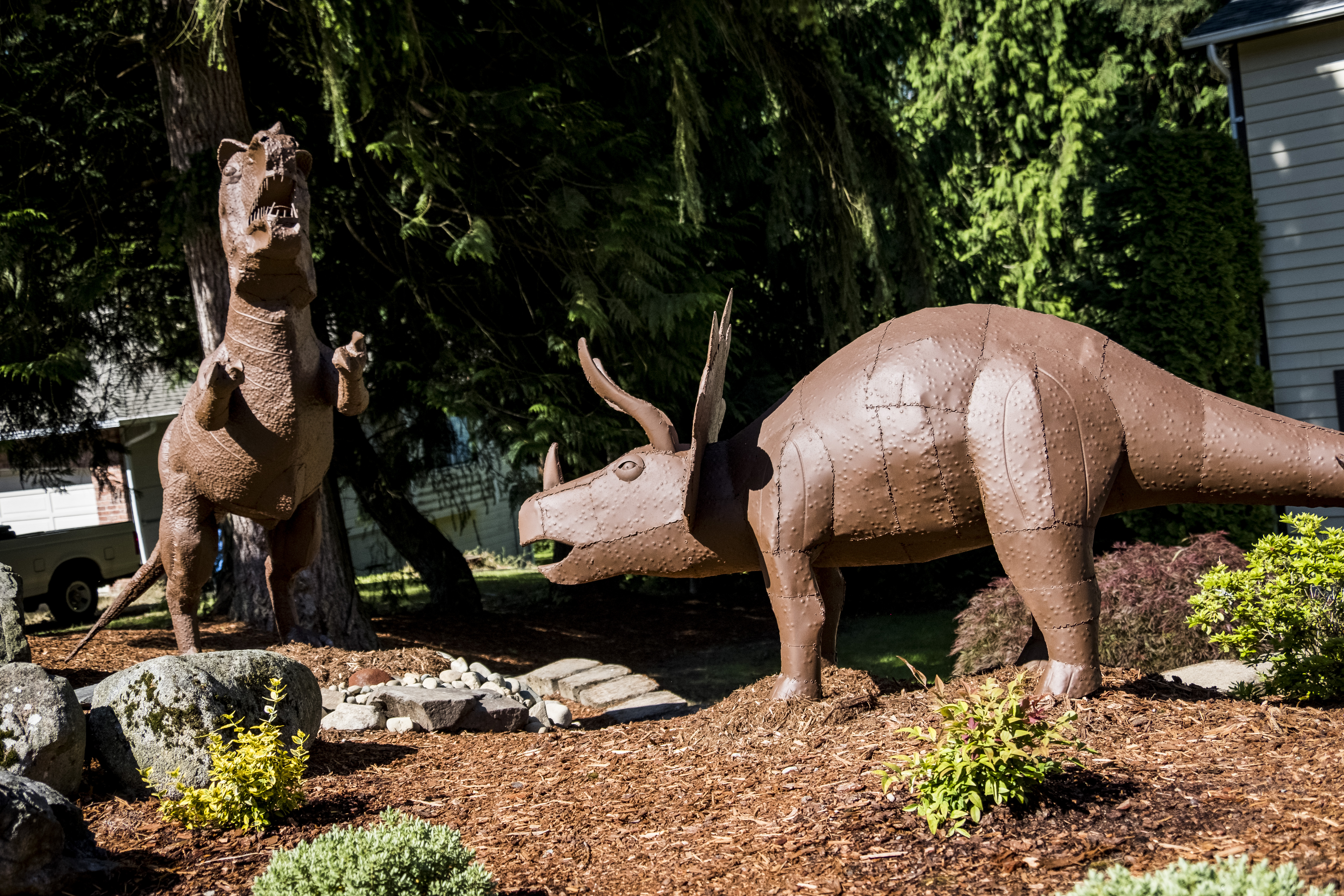 Jurassic House Local family's yard boasts three massive dinosaur