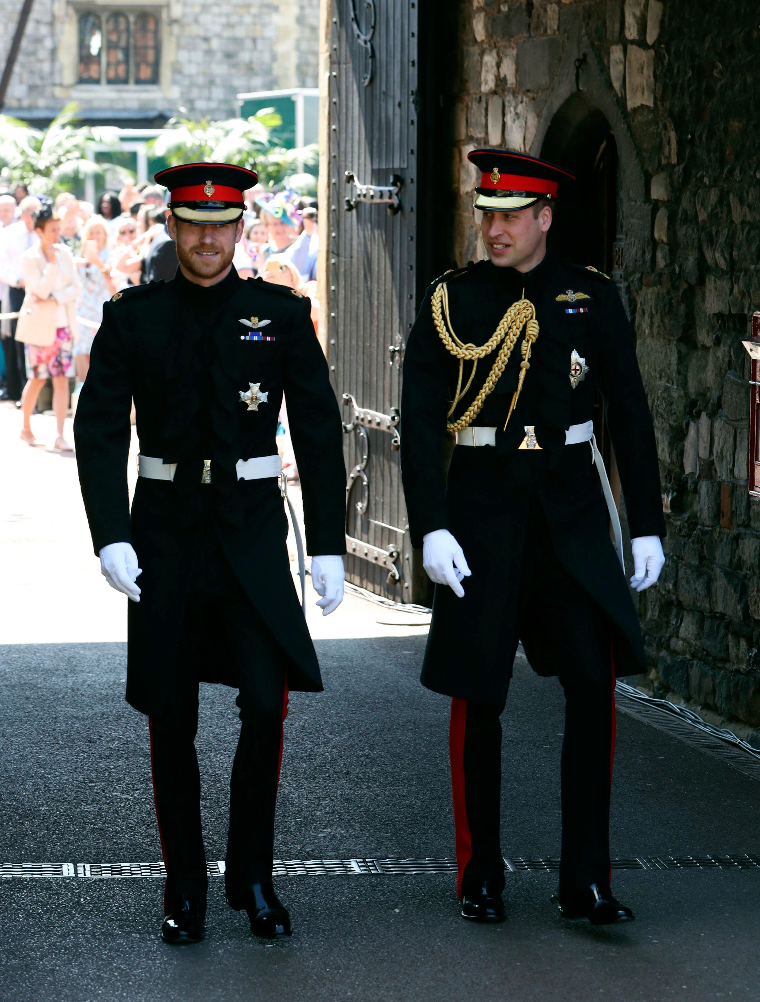 britains prince harry walks with his best man, prince william